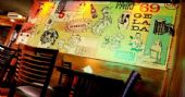 Happy hour com card�pio variado de bebidas e petiscos na Cervejaria Devassa